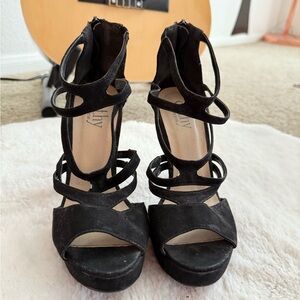 Strappy Black Stiletto Platforms – City Classified
Size 7 | Suede Finish